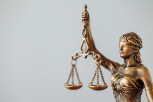 the symbol of justice and justice is a statuette of the goddess Themis judge’s gavel. legal advice