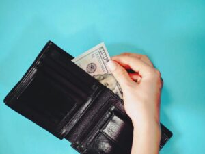 black-leather-wallet-with-cash-hundred-of-dollars-2025-03-10-02-15-09-utc
